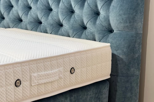 Magnitude showroom bed mattress detail